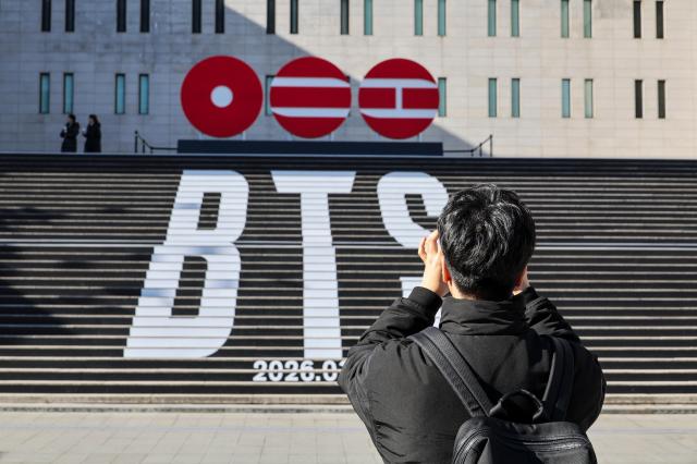 The staircase of the Sejong Center for the Performing Arts in Jongno-gu Seoul is decorated with promotional materials for BTS which is set to return with its fifth full-length album in March on Jan 7 AJP Yoo Na-hyun