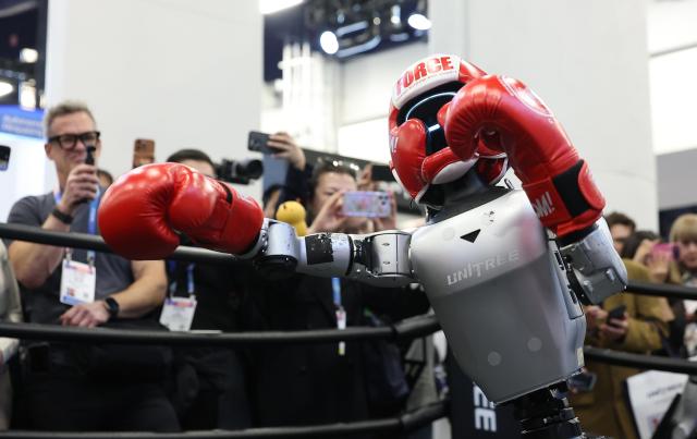 A robot demonstrates a combat performance at the booth of Chinese robotics company Unitree at the Las Vegas Convention Center LVCC during the second day of CES 2026 in Las Vegas Nevada on Jan 7 2026 local time Yonhap