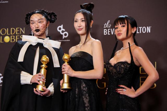 Audrey Nuna EJAE and Rei Ami pose with the Best Original Song - Motion Picture award for Golden from KPop Demon Hunters at the 83rd Annual Golden Globes in Beverly Hills California US January 11 2026 REUTERSMario Anzuoni  Courtesy of Yonhap