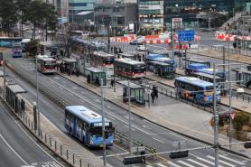Buses back running in Seoul after strike ends