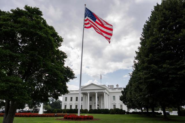 An American flag flies in front of the White House in Washington DC on July 23 2025 AP-Yonhap