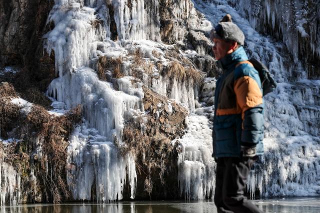 An artificial waterfall along Hongjecheon Stream in Seodaemun-gu Seoul is frozen on the afternoon of Jan 20 2026 AJP Yoo Na-hyun