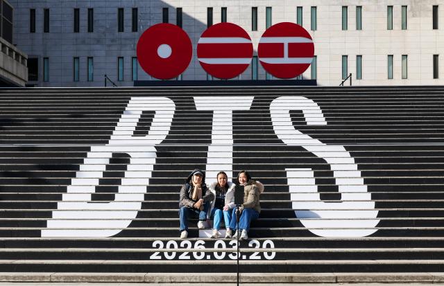 The staircase of the Sejong Center for the Performing Arts in Jongno-gu Seoul is decorated with promotional materials for BTS which is set to return with its fifth full-length album in March on Jan 7 AJP Yoo Na-hyun