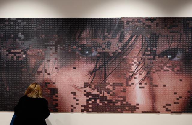 A visitor attaches a message card at the message zone for V at V TYPE 非 ON-SITE IN SEOUL held at Frieze Seoul in Jung-gu Seoul on Jan 22 2026