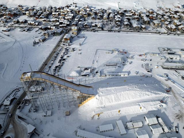 A drone view shows the big ski jump in the snow park in Livigno which will host all Snowboard and Freestyle Skiing events as part of the Milano Cortina Winter Olympic games in Italy January 9 2026 REUTERSYonhap