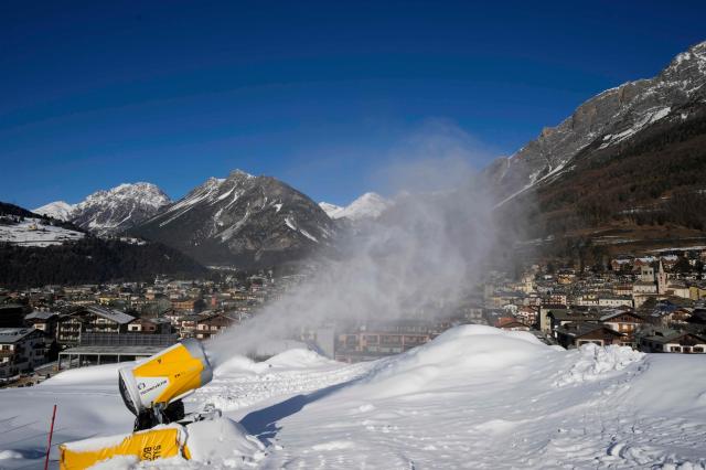 A snow gun sprays artificial snow at the Stelvio Ski Center venue for the alpine ski and ski mountaineering disciplines at the 2026 Milan Cortina Winter Olympics in Bormio Italy Jan 16 2025 AP Yonhap