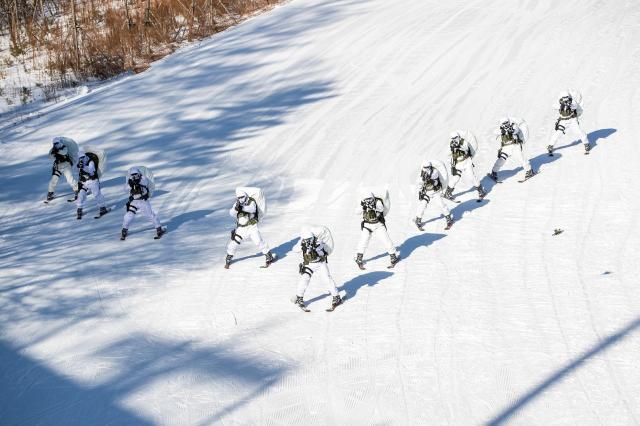 ROK Army Special Warfare Command soldiers conduct snow mobility training using skis in Daegwallyeong Gangwon Province on Jan 22 2026