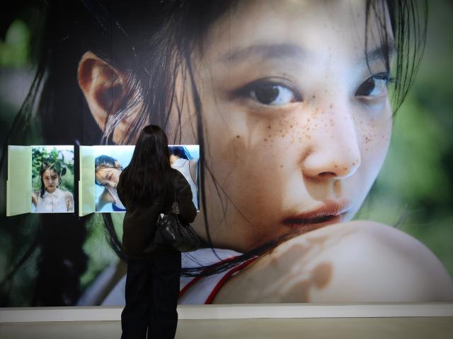 A visitor views the exhibition at Jennies exhibition held at USQUARE in Jongno Seoul on Jan 23 2026 AJP Han Jun-gu