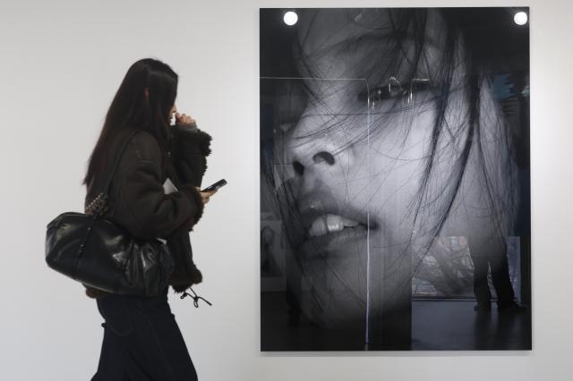 A visitor views the exhibition at Jennies exhibition held at USQUARE in Jongno Seoul on Jan 23 2026 AJP Han Jun-gu