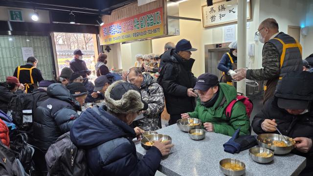 Elderly people eat lunch at a soup kitchen in Jongno-gu Seoul on Jan 23 2026 Courtesy of the soup kitchen 