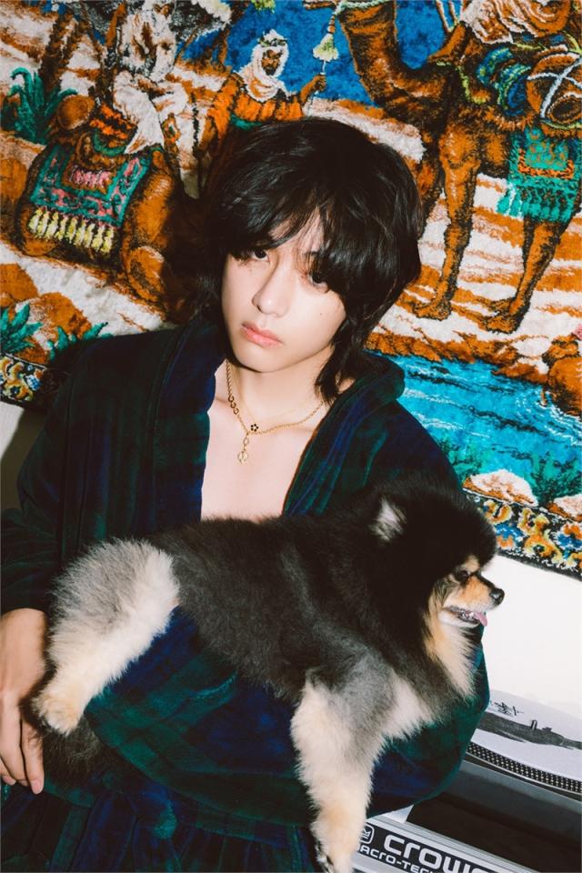 This photo show K-pop superstar BTS V with his pet Yeontan Photo provided by BIGHIT Music