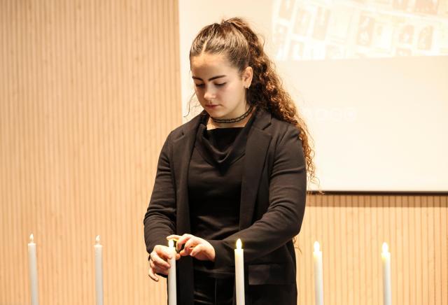A candle-lighting ceremony is held, with each candle representing one million Jewish lives lost in the Holocaust. AJP Yoo Na-hyun