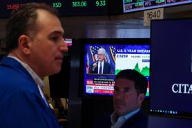 Wall Street Ends Mixed After Fed Holds Rates; S&P 500 Briefly Tops 7,000