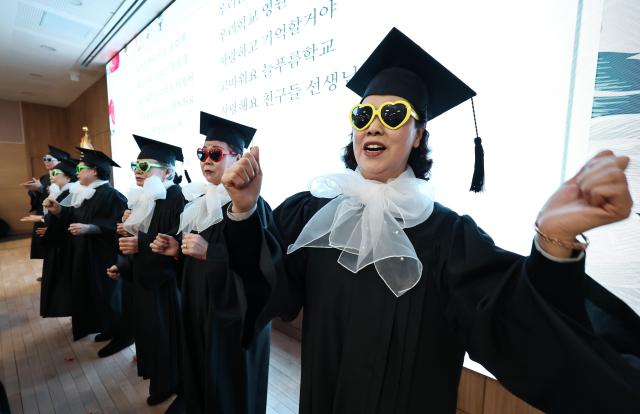 Adult graduates perform during a celebratory event at the 2025 Neulpureum School elementary and middle school graduation ceremony at the annex building of Yeongdeungpo District Office in Seoul on Jan 28 2026 Yonhap