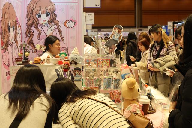 Visitors view booths at K-illustration Fair Seoul 2026 at COEX in Gangnam Seoul Jan 30 2026 AJP Han Jun-gu