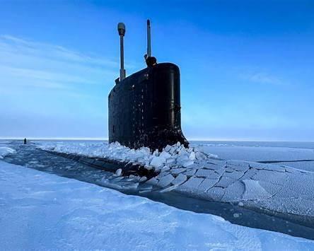US Navy photo submarine surfacing through ice during Ice Exercise ICEX