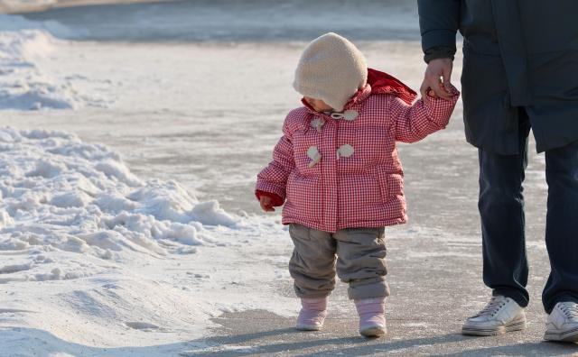 Tourists walk near Gyeongbokgung in Seoul as snow that fell overnight remains on the ground on Feb 2 2026 AJP Yoo Na-hyun