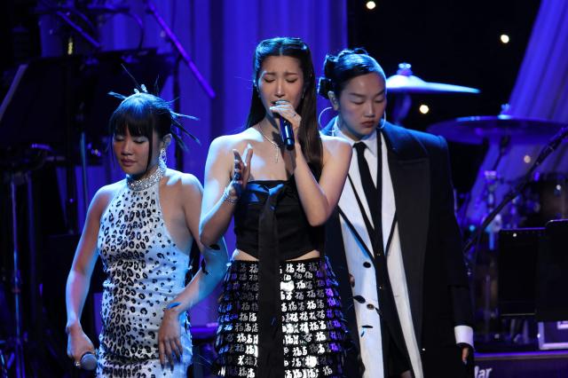 L-R South Korean singer Rei Ami South Korean-US singer EJAE and US singer Audrey Nuna perform onstage during the Recording Academy and Clive Davis Salute To Industry Icons pre-Grammy gala at the Beverly Hilton hotel in Beverly Hills California on January 31 2026 Photo by Patrick T Fallon  AFP2026-02-01 154618 courtesy of Yonhap