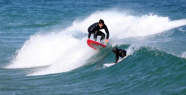 A surfer enjoys the winter sea at Yonghan-ri Beach in Heunghae-eup Buk-gu Pohang North Gyeongsang Province on Feb 1 2026 Yonhap
