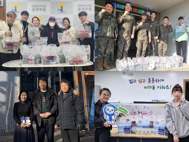 패밀리와 함께하는 치킨 릴레이에 참여한 BBQ 패밀리들이 기념촬영을 하고 있다 사진제너시스BBQ그룹