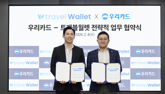 우리카드가 트래블카드 기업 트래블월렛과 디지털 금융과 결제 서비스 분야에서의 전략적 협업 강화를 위한 업무협약을 체결했다 사진우리카드