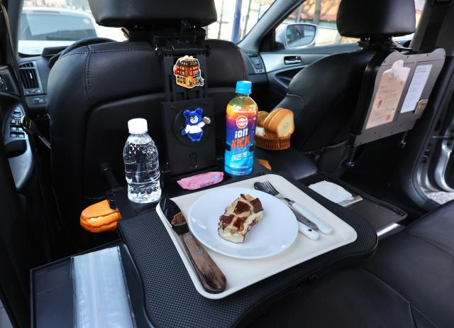 A foldable table is installed inside the Daejeon Bread Taxi Daejeon Feb 3 2026 AJP Han Jun-gu