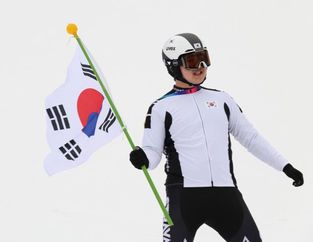 Skiers dressed as athletes from various winter sports cheer alongside regular skiers and snowboarders during a cheering event at Konjiam Resort ski resort in Gwangju Gyeonggi Province on Feb 10 2026 AJP Yoo Na-hyun