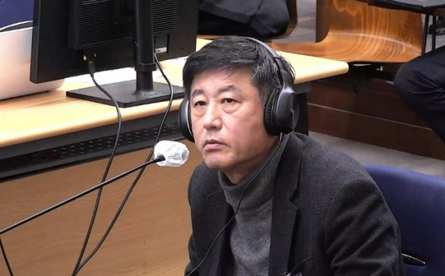 노상원 전 국군정보사령관이 작년 12월 8일 서울중앙지법에서 열린 윤석열 전 대통령의 내란 우두머리 직권남용 권리행사방해 혐의 사건 속행 공판에서 증언을 거부하고 있다 사진연합뉴스