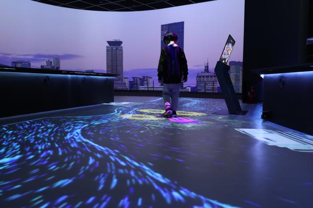 A kid views an exhibition at My Friend Seoul gallery at Seoul City Hall Feb 12 2026 AJP Han Jun-gu