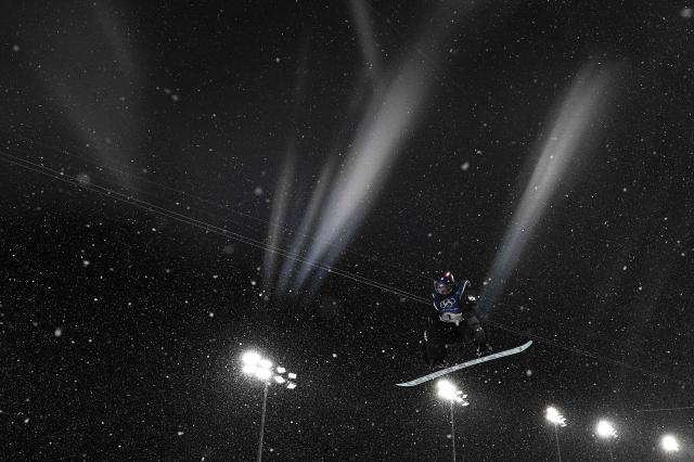 South Koreas Choi Gaon competes in the snowboard womens halfpipe final run 3 during the Milano Cortina 2026 Winter Olympic Games at Livigno Snow Park in Livigno Valtellina on February 12 2026 AFPYonhap