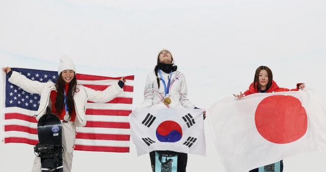 The era of Choi Ga-on begins

LivignoYonhap Shin Jun-hee  South Korea’s Choi Ga-on exhales after winning the gold medal in the women’s snowboard halfpipe final at the Milano Cortina 2026 Winter Olympics at Livigno Snow Park in Italy on Feb 12 local time At left is silver medalist Chloe Kim of the United States and at right is bronze medalist Mitsuki Ono of Japan Feb 13 2026 Courtesy of Yonhap News Agency