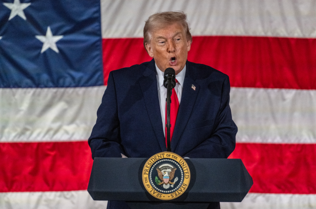 US President Donald Trump delivers remarks to service members and their families at Fort Bragg North Carolina on Feb 13 2026 EPA-Yonhap