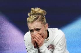 Copyright Issues Over Pop Music Spotlight Olympic Figure Skating as Amber Glenn Places 13th