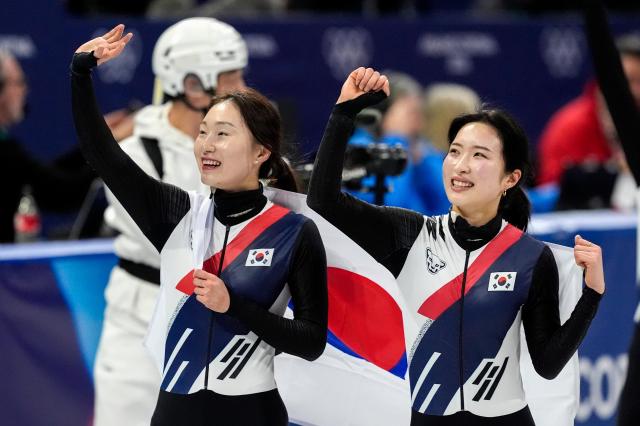 Members of Team Korean celebrate after winning gold during the Womens Short Track Speed Skating 3000m Relay Finals at the Milano Figure Skating Arena in Milan Italy on Wednesday February 18 2026 Italy won silver and Canada won bronze UPIYonhap
