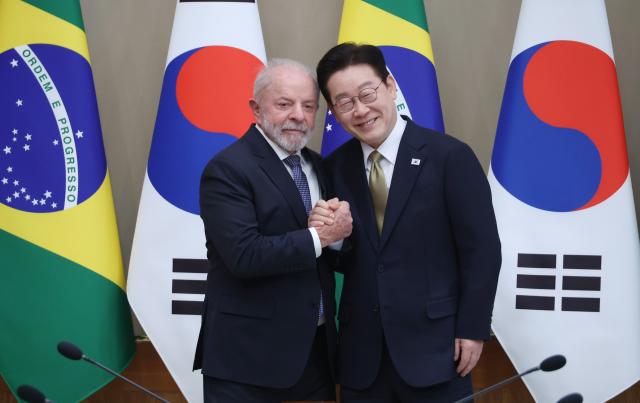 Brazilian and South Korean leaders pose for a picture ahead of an expanded summit meeting at Cheong Wa Dae on Feb 23 2026 Yonhap
