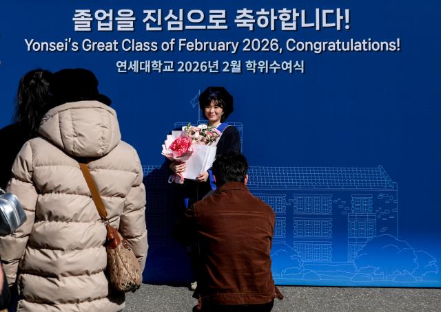A degree conferment ceremony for February 2026 graduates is underway at the open-air amphitheater of Yonsei University’s Sinchon campus in Seodaemun District Seoul Feb 23 2026 AJP Yoo Na-hyun