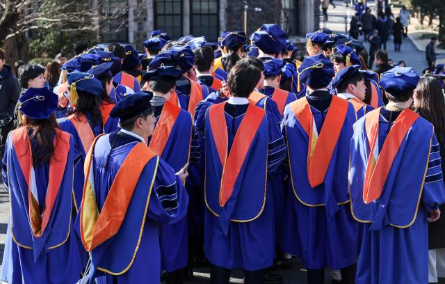 A degree conferment ceremony for February 2026 graduates is underway at the open-air amphitheater of Yonsei University’s Sinchon campus in Seodaemun District Seoul Feb 23 2026 AJP Yoo Na-hyun