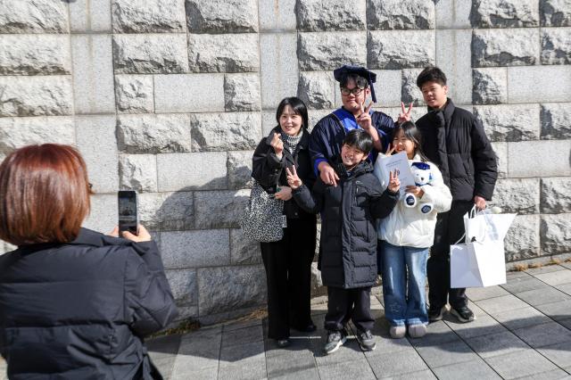 A degree conferment ceremony for February 2026 graduates is underway at the open-air amphitheater of Yonsei University’s Sinchon campus in Seodaemun District Seoul Feb 23 2026 AJP Yoo Na-hyun