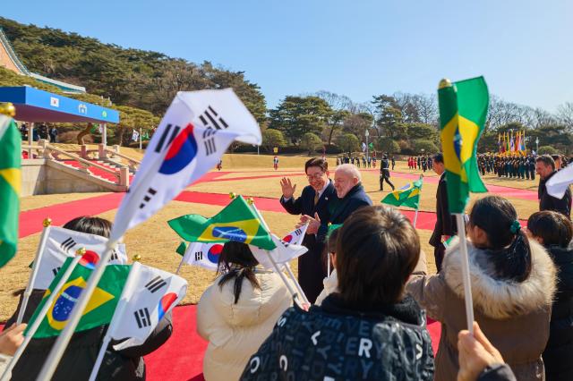 An official welcoming ceremony for Brazilian President Luiz Inácio Lula da Silva the first state guest received since President Lee Jae-myung’s return to Cheong Wa Dae is held at the main garden of Cheong Wa Dae in Seoul on Feb 23 2026 Yonhap