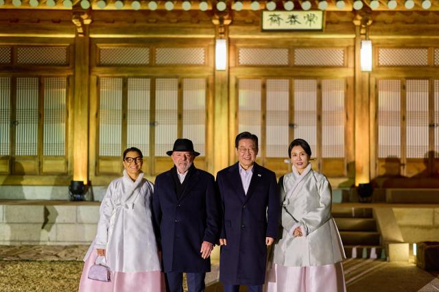President Lee Jae Myung and First Lady Kim Hye-kyung pose for a commemorative photo with Brazilian President Luiz Inácio Lula da Silva and First Lady Rosângela Lula da Silva at Sangchunjae inside Cheong Wa Dae in Seoul on Feb 23 2026 Provided by Cheong Wa Dae