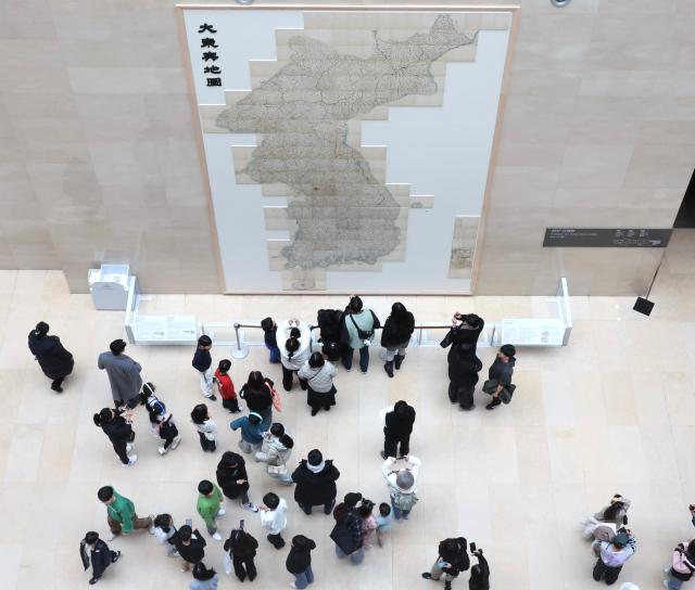 Visitors view a full-scale print of Daedong Yeojido Great Map of the East at the National Museum of Korea in Yongsan Seoul Feb 24 2026 AJP Han Jun-gu