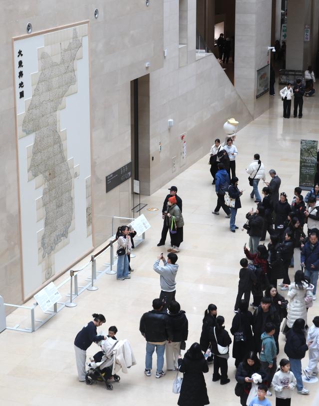 Visitors view a full-scale print of Daedong Yeojido Great Map of the East at the National Museum of Korea in Yongsan Seoul Feb 24 2026 AJP Han Jun-gu