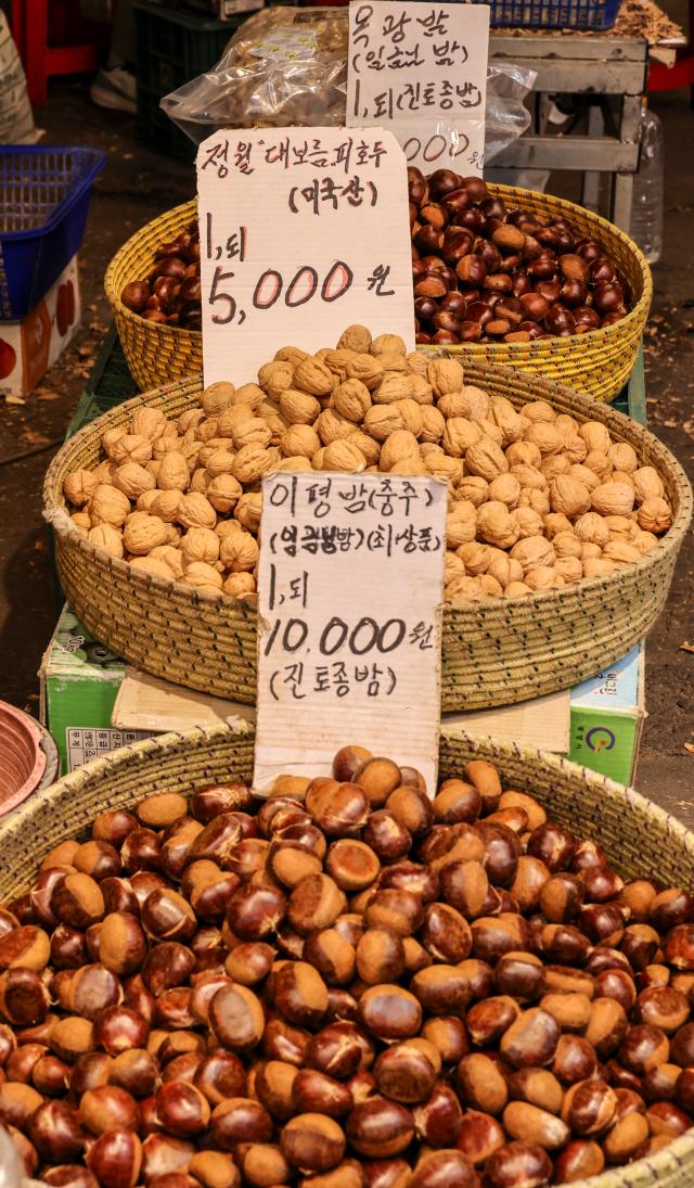 Assorted bureom including peanuts and walnuts are displayed at Gyeongdong Market in Dongdaemun District Seoul on Feb 27 2026 AJP Yoo Na-hyun