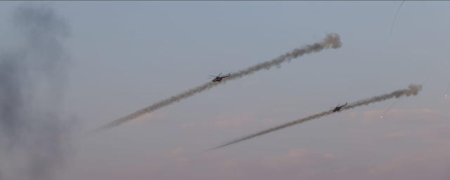 Mi-17 helicopters maneuvering through the smoke at low altitude during tactical operations at Pokhran Range in Jaisalmer India on Feb 28 2026 Courtesy of the Indian Air Force