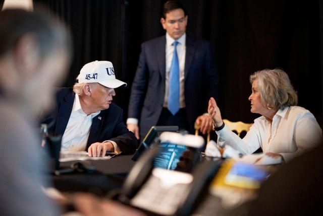 This official White House photograph made available on February 28 2026 and released on the White House X account shows US President Donald Trump 2L speaking to White House Chief of Staff Susie Wiles R watched by US Secretary of State Marco Rubio C while monitoring Operation Epic Fury activity against Iran from an unnamed location on February 28 2026  Photo by The White House  AFP Yonhap