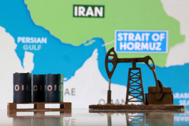 3D-printed oil barrels an oil pump jack and a map showing the Strait of Hormuz and Iran appear in this illustration taken March 2 2026 REUTERSYonhap
