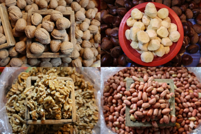 Walnuts chestnuts and peanuts are sold at a traditional market in Bupyeong for Jeongwol Daeboreum Mar 3 2026 AJP Han Jun-gu