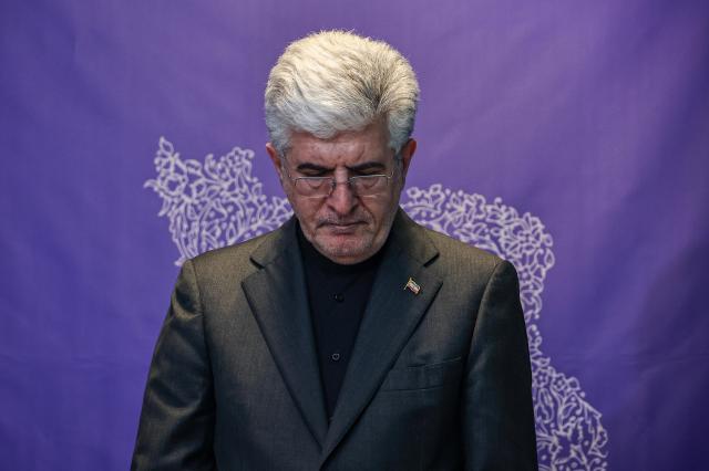 Saeid Koozechi ambassador of the Islamic Republic of Iran to South Korea observes a moment of silence before delivering an official statement on Israeli and US military strikes against Iran at the Iranian Embassy in Yongsan Seoul March 5 AJPYoo Na-hyun