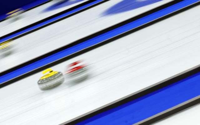 A wheelchair curling mixed doubles preliminary match takes place at the Cortina Curling Olympic Stadium in Cortina Italy during the 2026 Milan–Cortina Winter Paralympics on Mar 5 2026 Yonhap 20260306