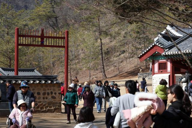 Tourists continue to visit Jangneung the tomb of King Danjong in Yeongwol County Gangwon Province March 8 2026